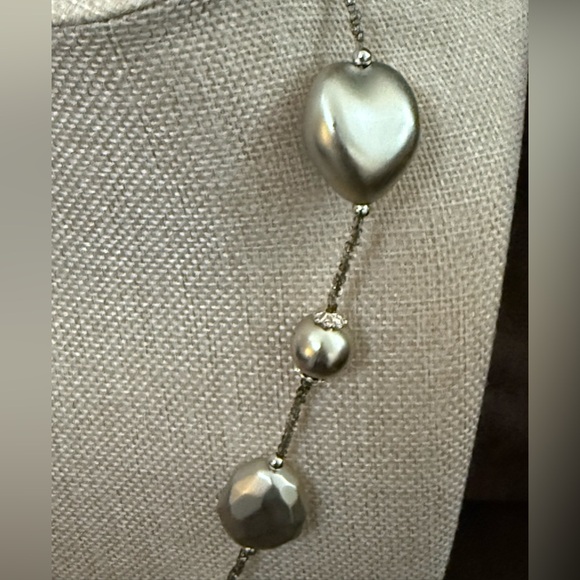 Featuring large silver faux pearls & silver shaped beads on thin wire or cord. - Picture 4 of 6